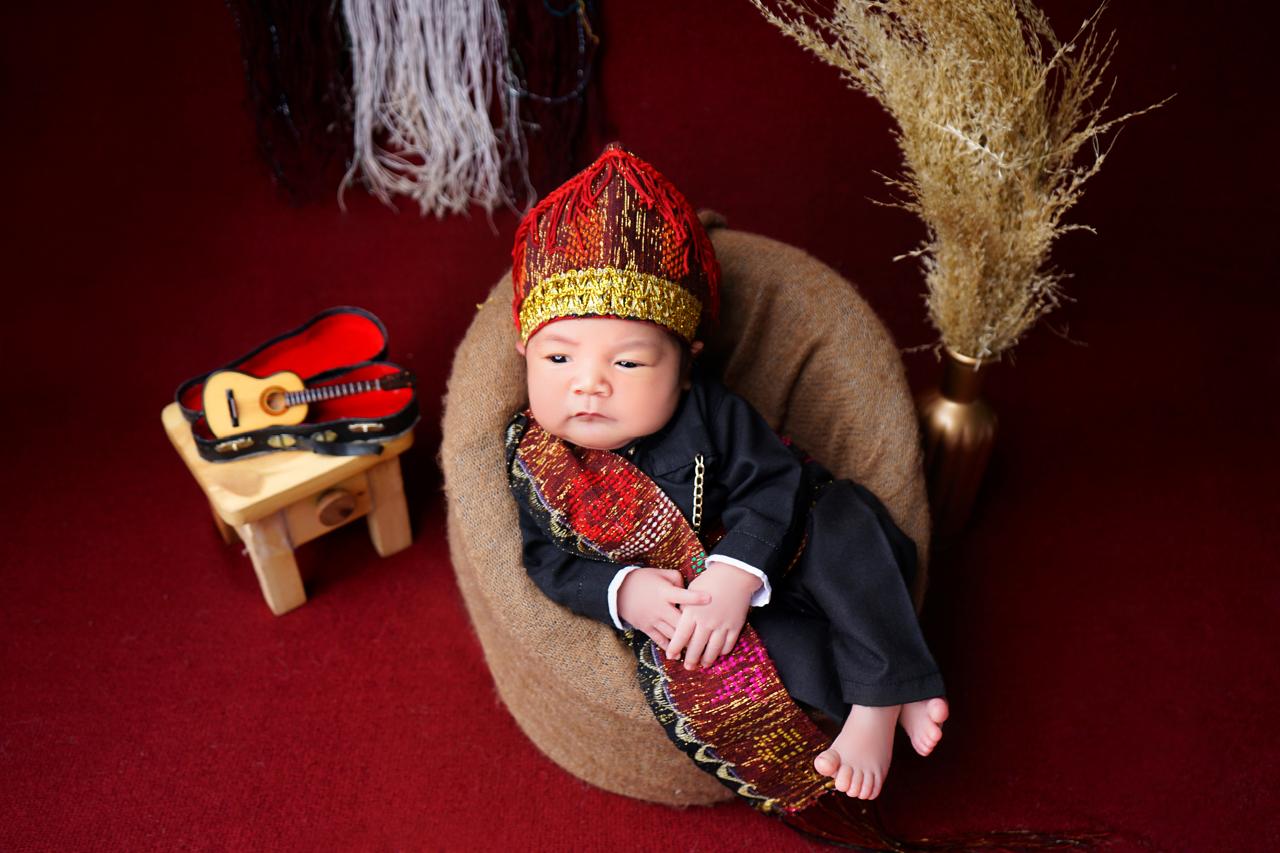 Raymond & Yohakim 1